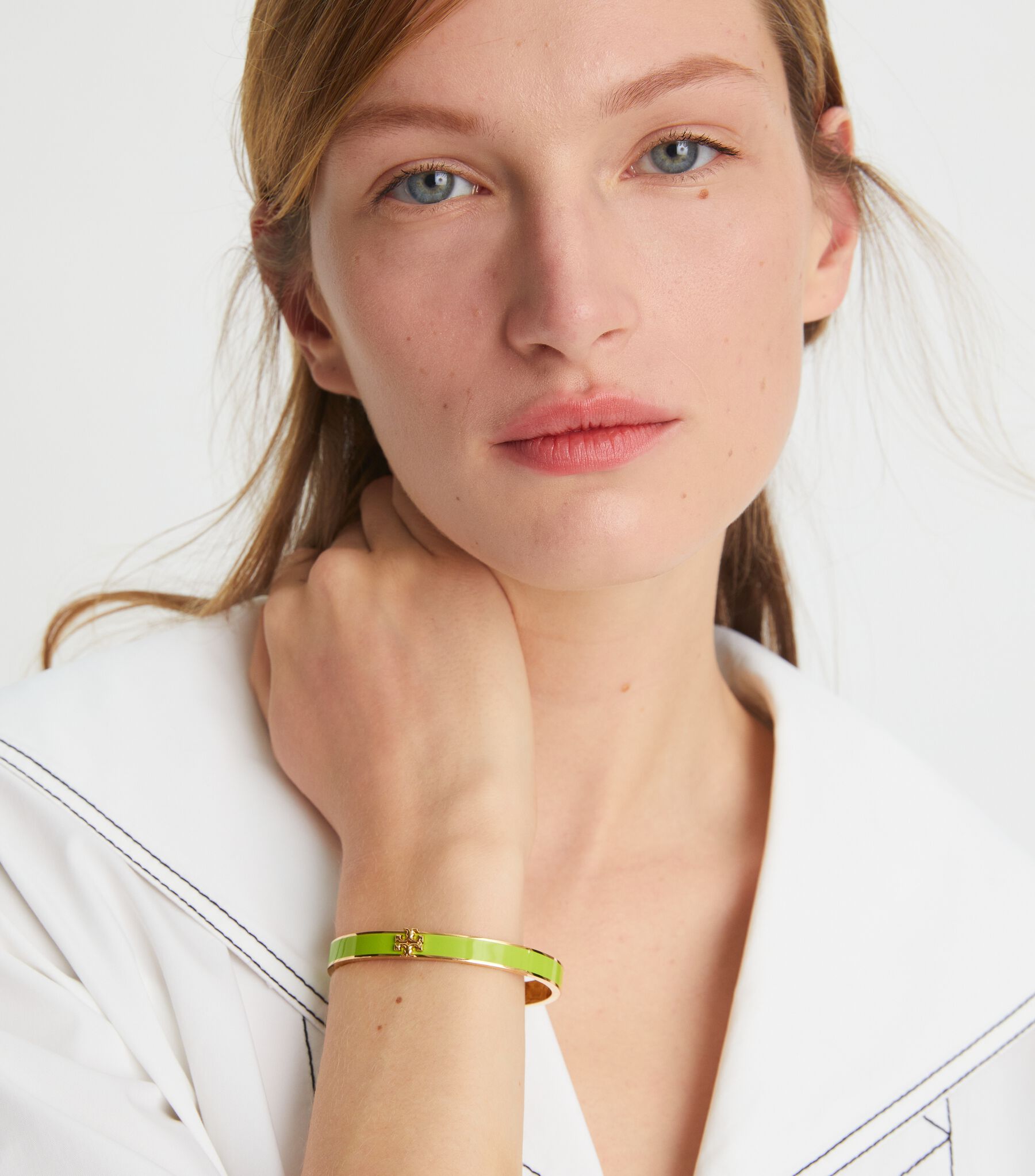Tory Burch Kira Enamel Cuff Bracelet in a gold-plated finish with orange enamel Kira Enamel 10mm Bracelet: Women main image 2