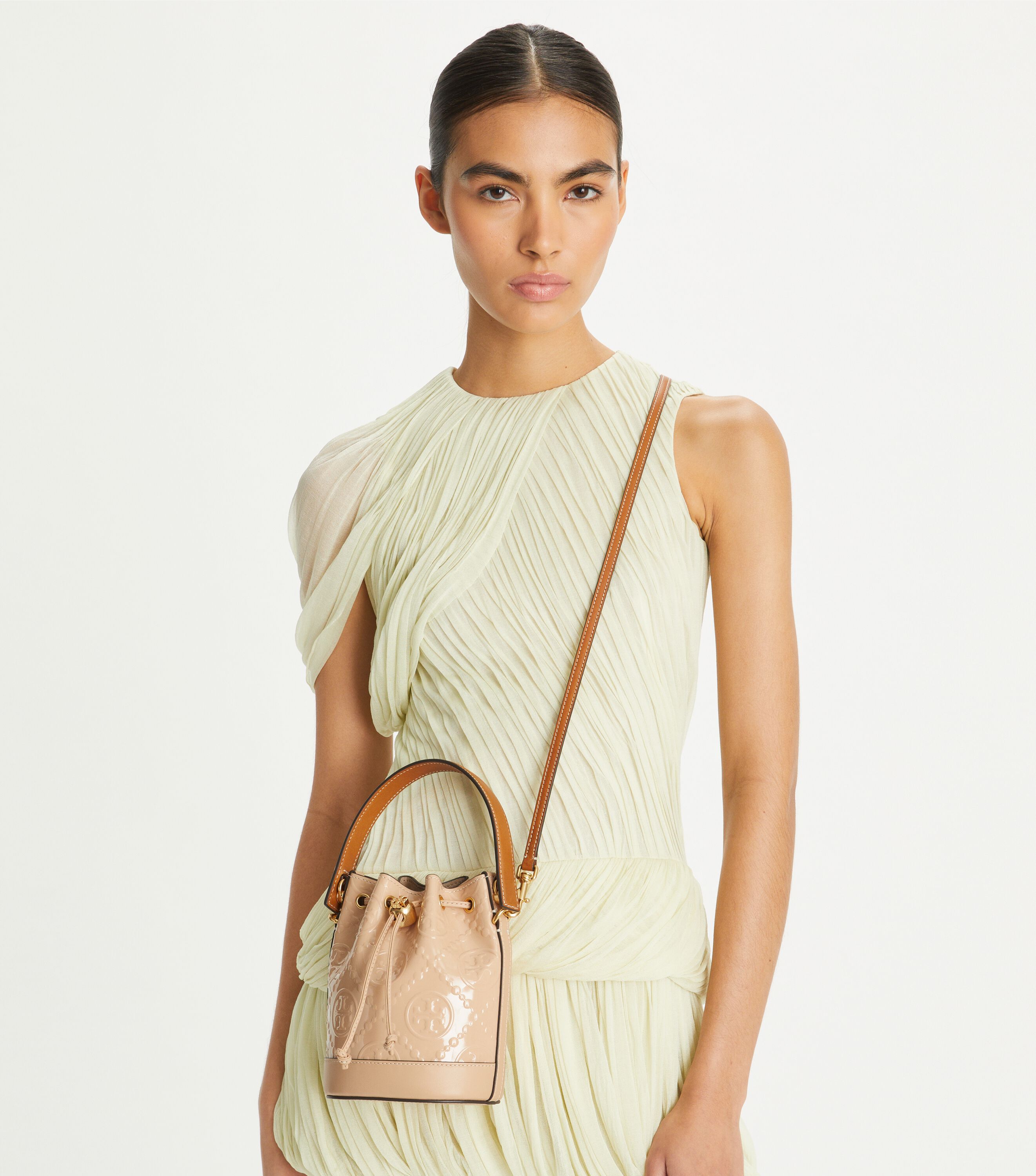 T Monogram Patent Embossed Mini Bucket Bag, Warm Chai | Tory